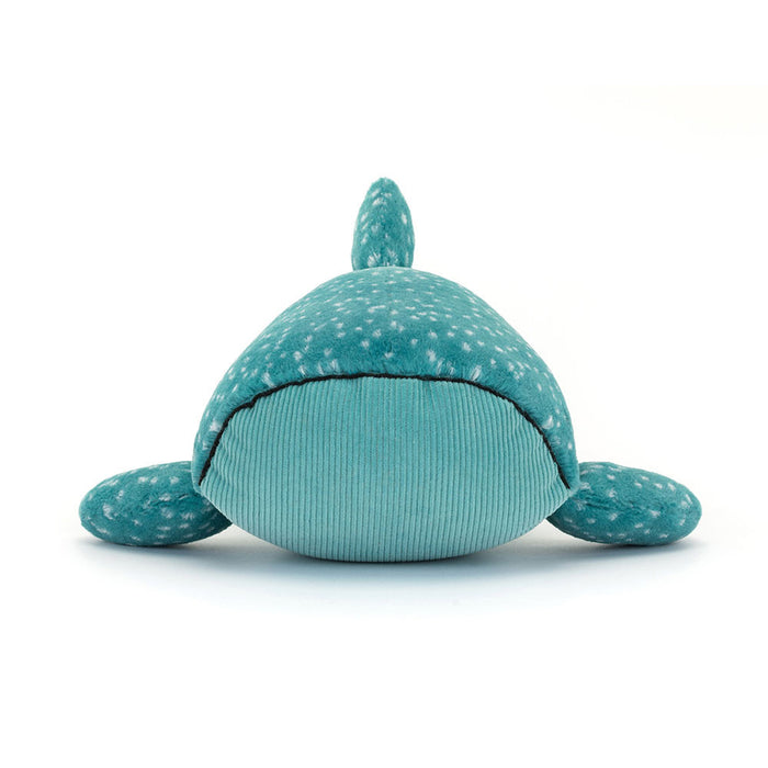 Teal plush toy with speckled pattern on a white background