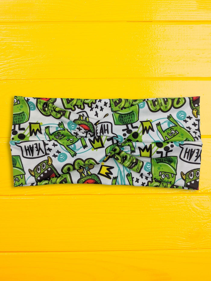 graffiti goblins poly spandex knot headband flat lay front view wide band knot detail