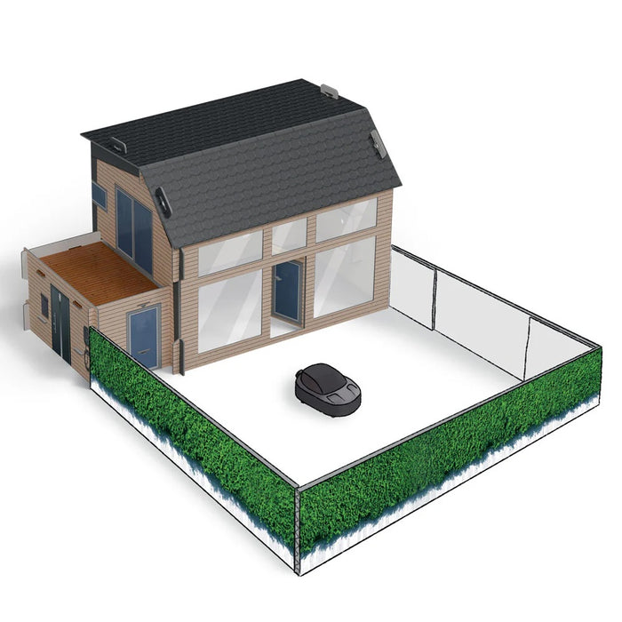 Model of a house with a robot lawn mower in front on a white background