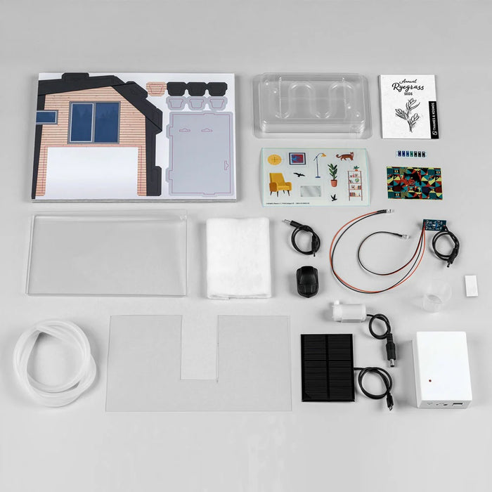 Collection of electronic components and tools on a gray surface