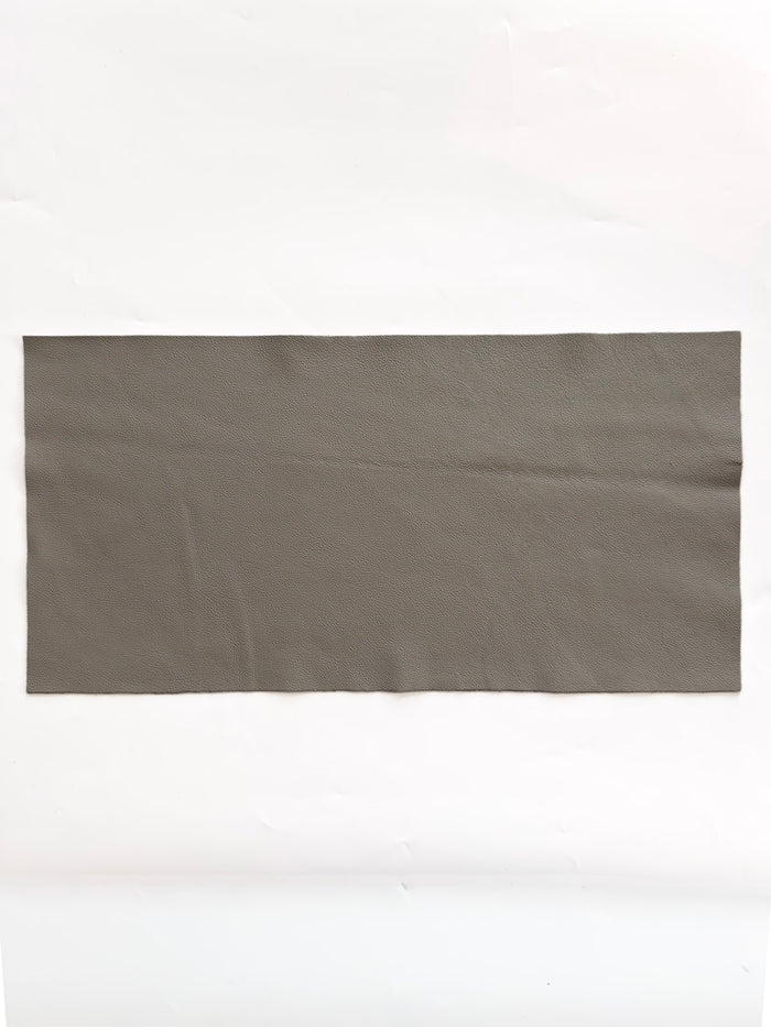 Grey Upholstery Cowhide, 12 × 24 in shown to display leather shape and cutting area