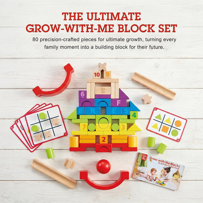 Grow-with-me block set with educational cards on a wooden surface
