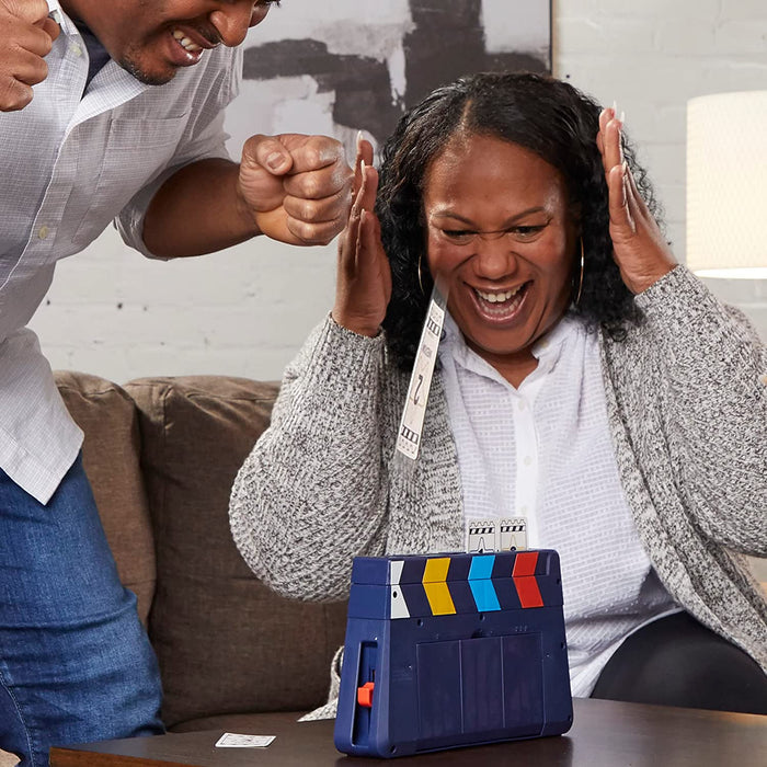 Two people playing Guesstures in a living room