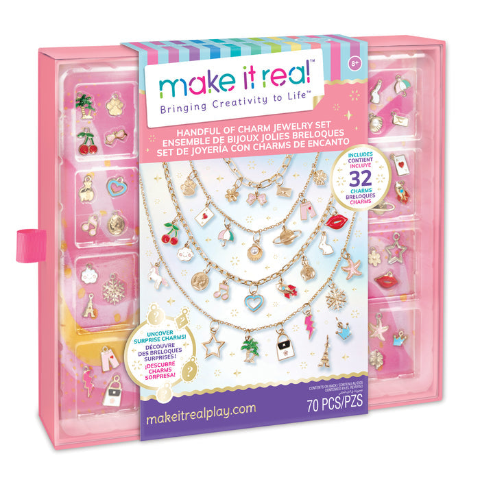 Pink packaging featuring lots of charms for the Handful of Charms Jewelry Set on a white backgrounds