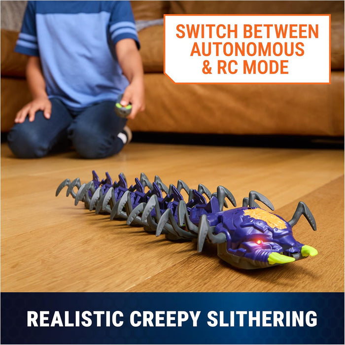 Hex Bot Explodapede on a wood floor with with text 'switch between automomous & rc mode'