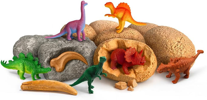 Assorted dinosaur toys on a white background
