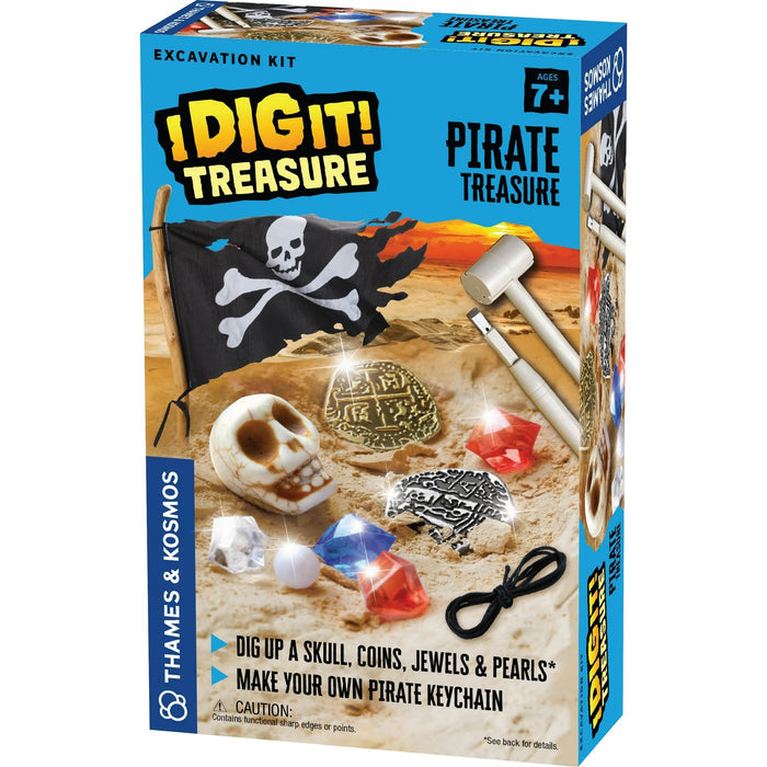 Pirate treasure excavation kit packaging with skull, coins, and jewels on a sandy background.
