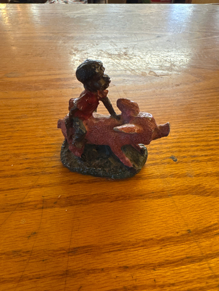 Lead Black Americana boy with pigs