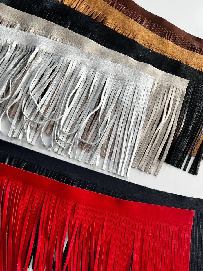 Deer-Tanned Leather Fringe, 1/4 × 7 in shown to display leather shape and cutting area