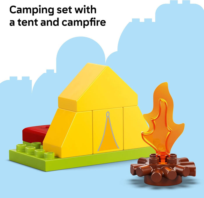 Toy camping set with a yellow tent and campfire on a blue background