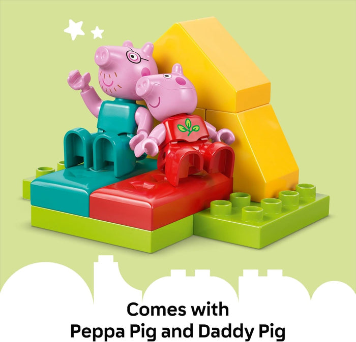 Toy building block set with Peppa Pig and Daddy Pig on a green background