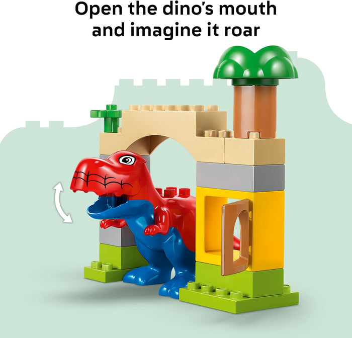 Toy dinosaur structure with a red and blue dinosaur figure inside, on a light green background.