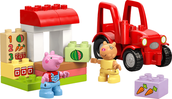 Toy figures and building blocks including a red tractor, pig character, and bear character on a transparent background.