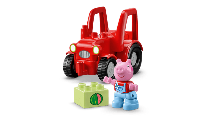 Red toy tractor with a pink pig character and blue robot character on a transparent background