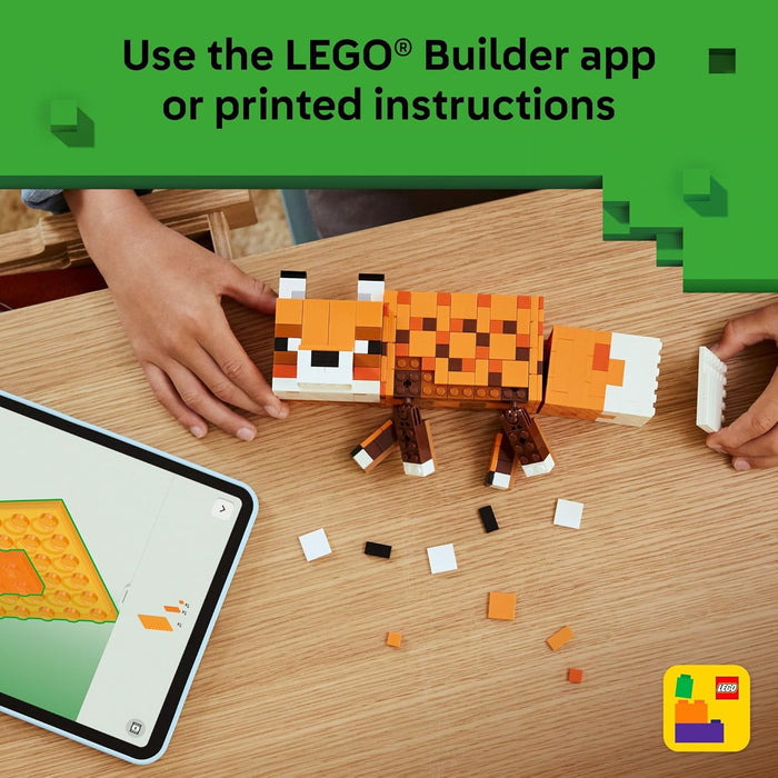 LEGO model being built on a table with a tablet displaying instructions, against a green background with LEGO branding.
