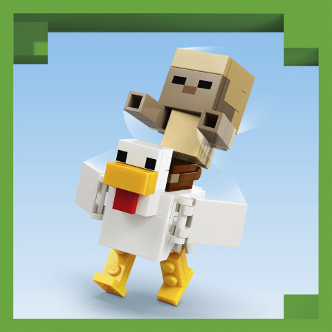 A toy figure resembling a chicken with yellow legs and beak, carrying a blocky character on its back, shown against a light blue background with a green decorative border.