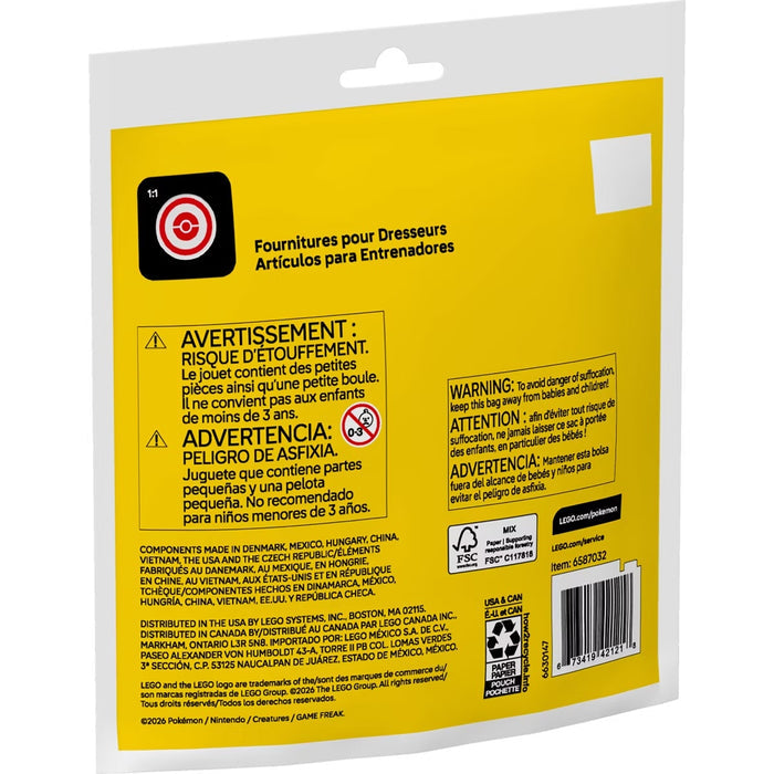 The back of a yellow plastic bag with bilingual warning labels and a barcode, photographed against a white background.