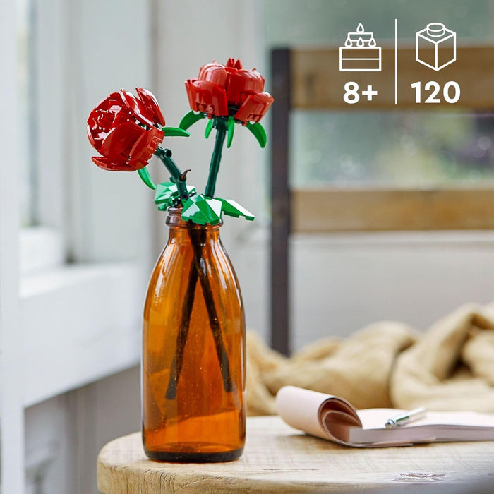 Red flower-shaped building blocks in an orange bottle on a table with a blurred background