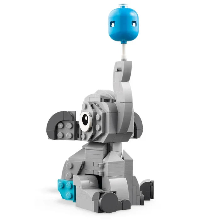 Toy figure made of interlocking bricks with a blue head and gray body on a white background
