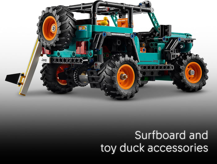 Jeep with surfboard and duck accessory on a gray background