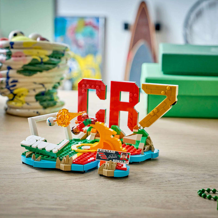 Colorful toy construction set on a wooden surface with blurred background