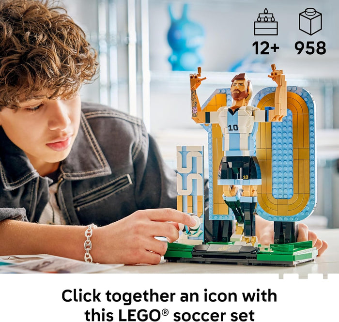 Person building a LEGO soccer set with a young boy, featuring LEGO icons and numbers.