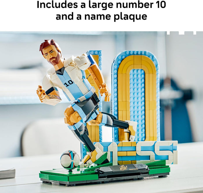 LEGO figure of a soccer player with a large number 10 and name plaque on a white surface.
