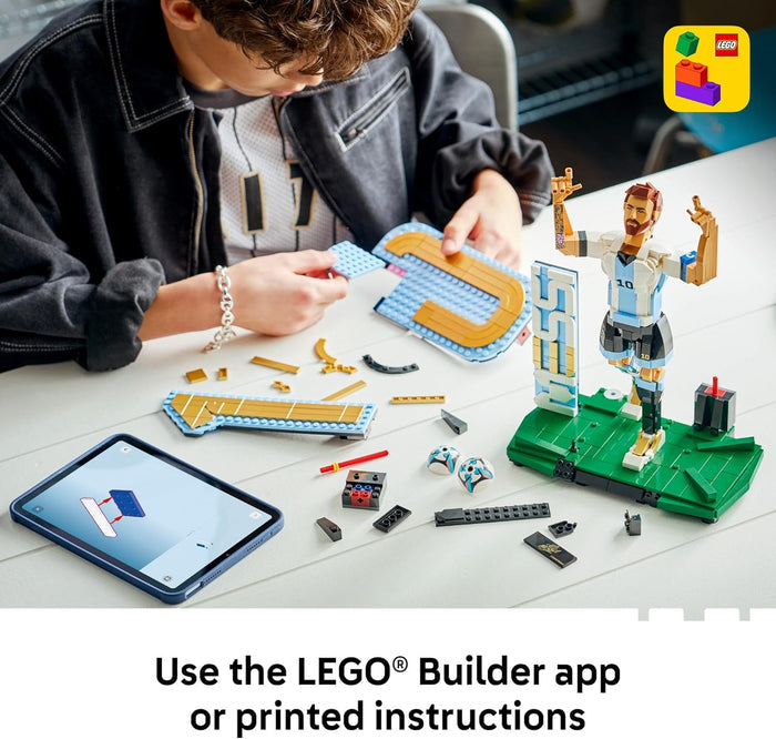 Person building a LEGO set with a tablet displaying the LEGO Builder app.