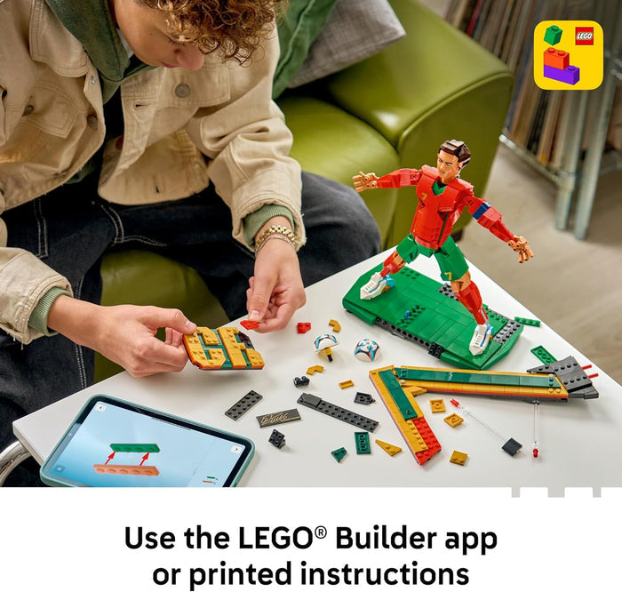 Two people playing with LEGO toys on a table, with a smartphone displaying instructions.