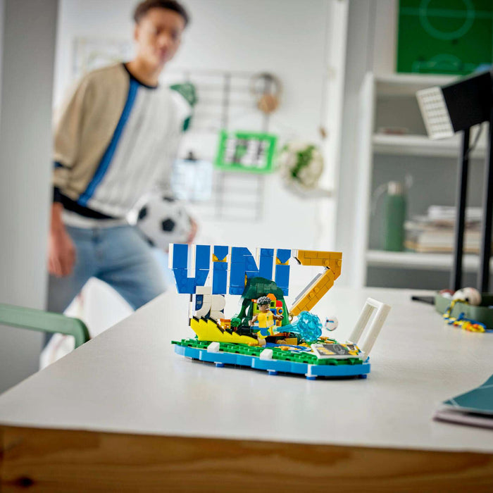 LEGO set on a table with a person in the background