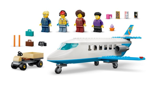 Toy airplane set with figures and accessories on a white background