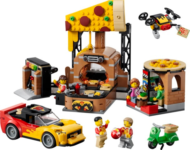 LEGO set with a pizza restaurant, car, and scooter on a white background