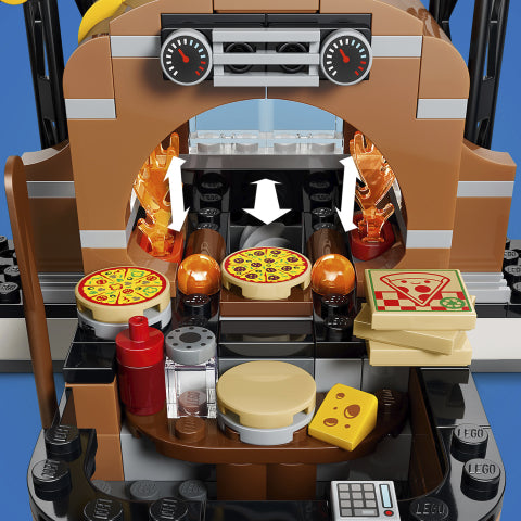 LEGO pizza oven set with pizzas, cheese, and other ingredients on a blue background