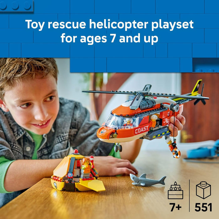 Child playing with a toy rescue helicopter set on a table, with text indicating it's suitable for ages 7 and up.
