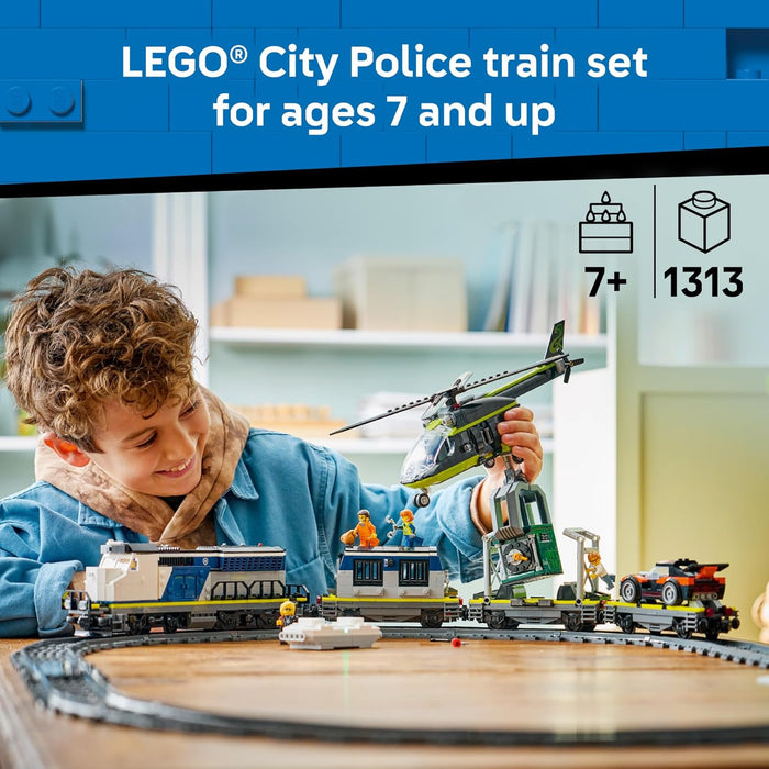 Child playing with LEGO City Police train set in a room with shelves.