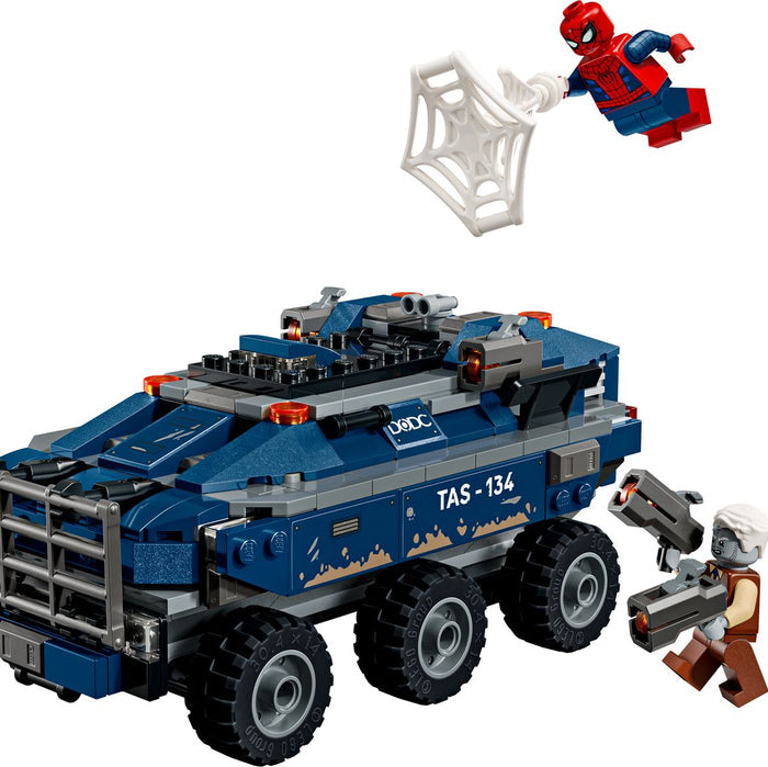 LEGO set with a vehicle labeled 'TAS-134' and Spider-Man figure on a white background