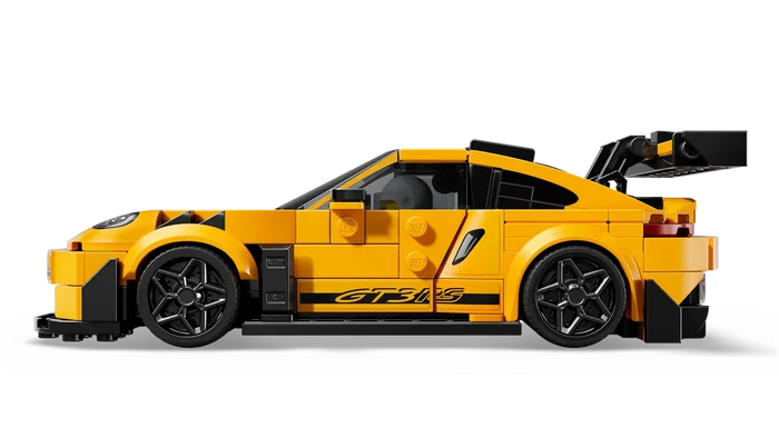 Yellow sports car model made of interlocking bricks on a white background