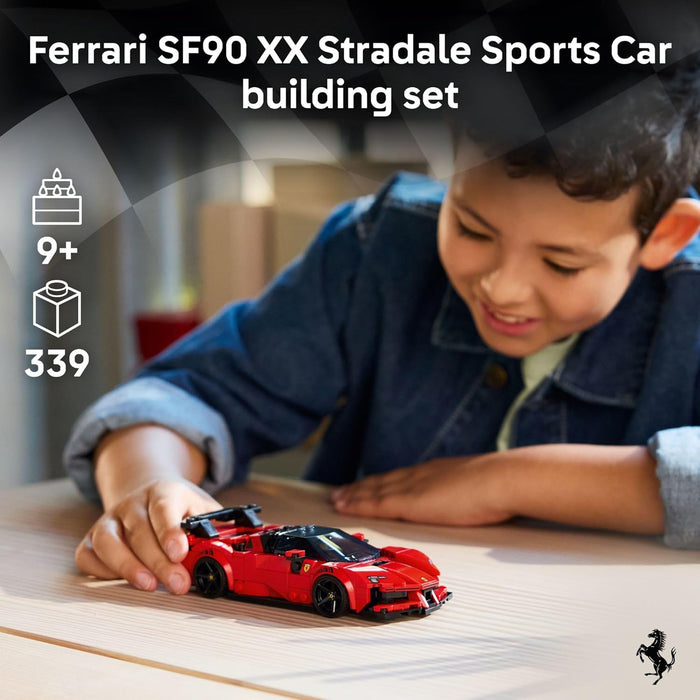 Child playing with a Ferrari SF90 XX Stradale sports car building set on a table.