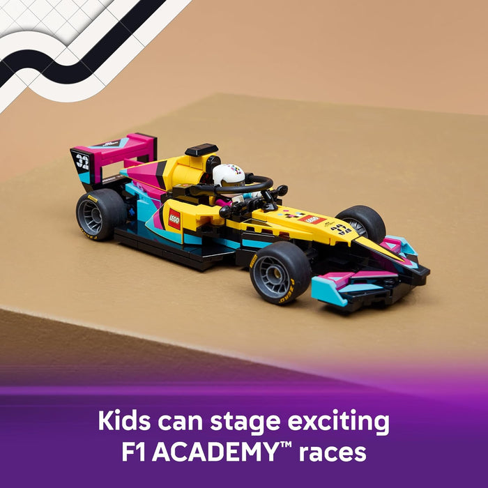 Colorful toy Formula 1 car on a brown surface with promotional text.