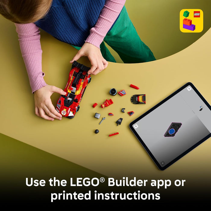 Child playing with LEGO bricks on a yellow table with a tablet displaying a LEGO app.