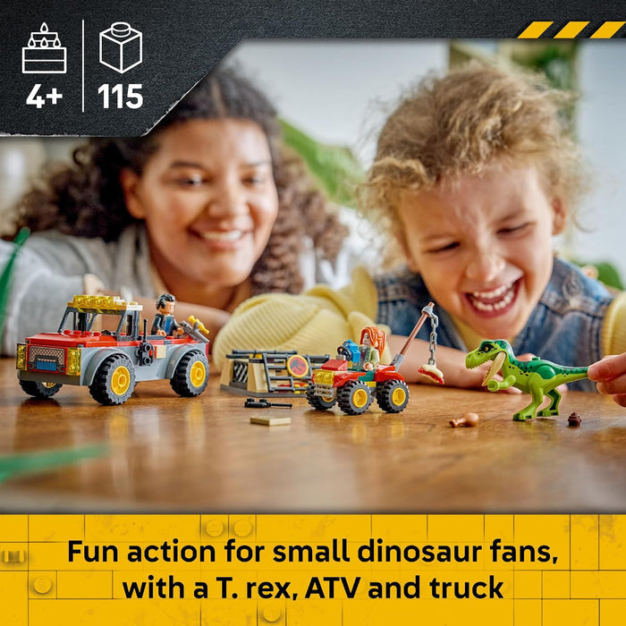 Two children smiling and playing with small toy construction vehicles and a green dinosaur figure on a wooden table. The scene includes a dark gray top banner with age and piece-count icons, and a yellow bottom banner with promotional text.