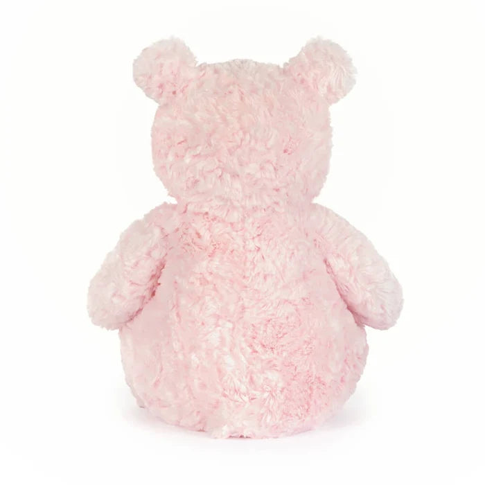 Rear view of a pink plush bear toy on a white background