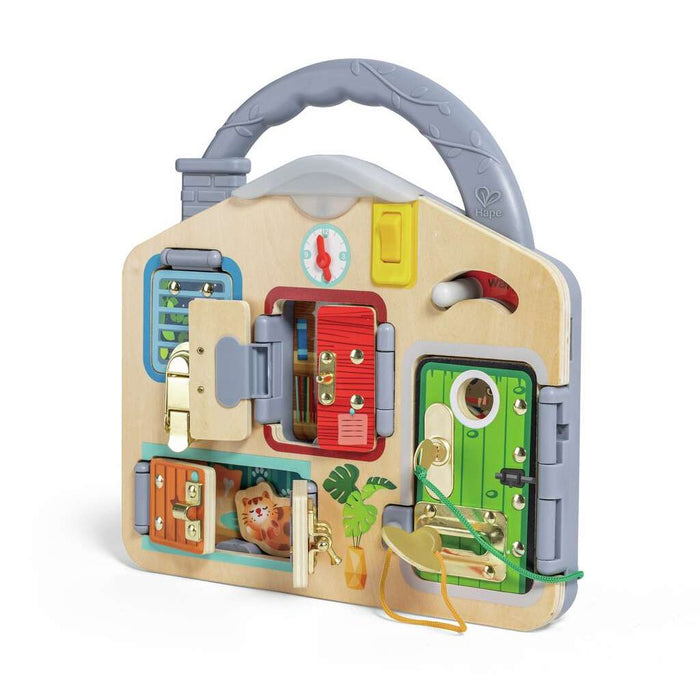 Colorful toy lock and learn playset in a carrying case on a white background