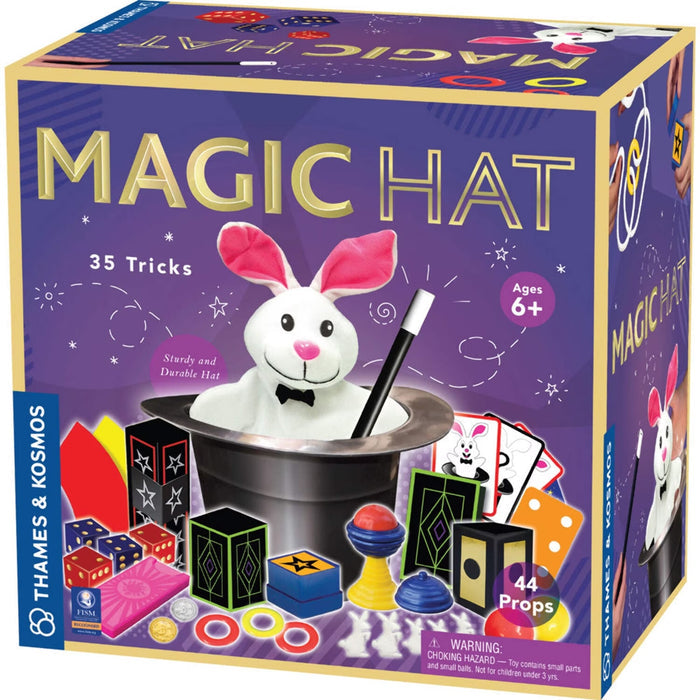 Box of 'Magic Hat' toy set with rabbit in hat and props on a purple background