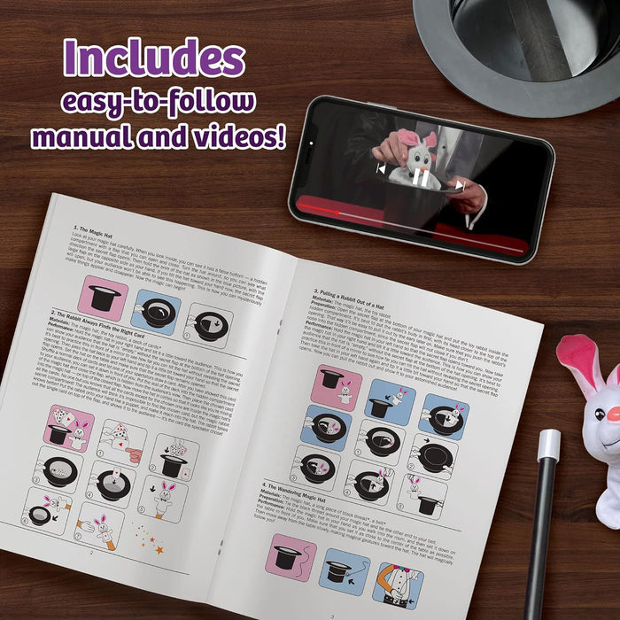Instruction manual for Magic Hat on a wooden table with a cell phone playing a video, with text 'Includes easy to follow manual and videos!'