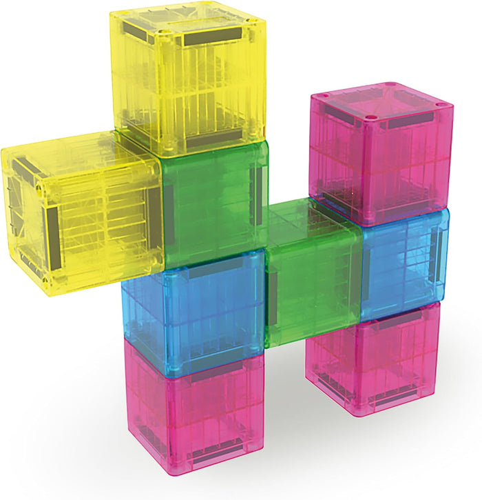 Blue, yellow, red, green and pink Magna Tile Cubes stacked in the shape of a dog on a white background