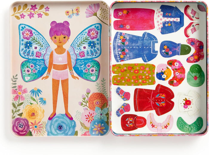 Colorful toy box with a butterfly-themed girl figure and various clothing items on a white background