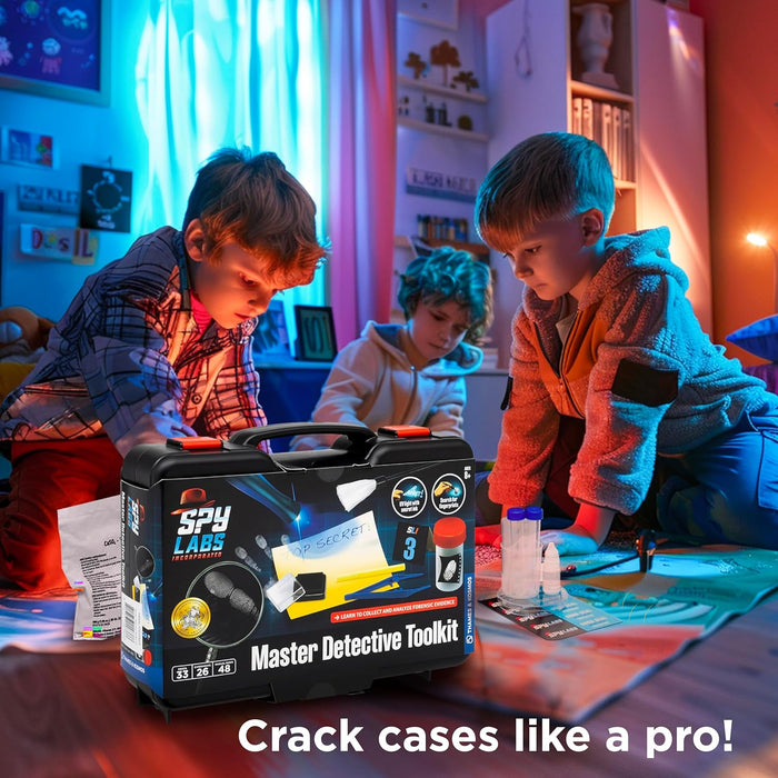 Children playing with a 'Master Detective Toolkit' toy set in a room.
