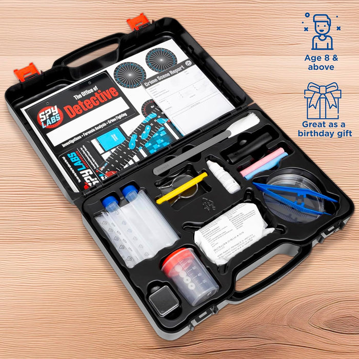 Spy Labs detective kit in a black case on a wooden surface