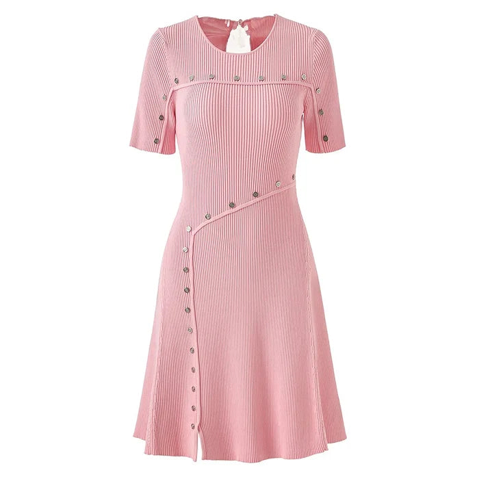 Pink dress with button details on a white background